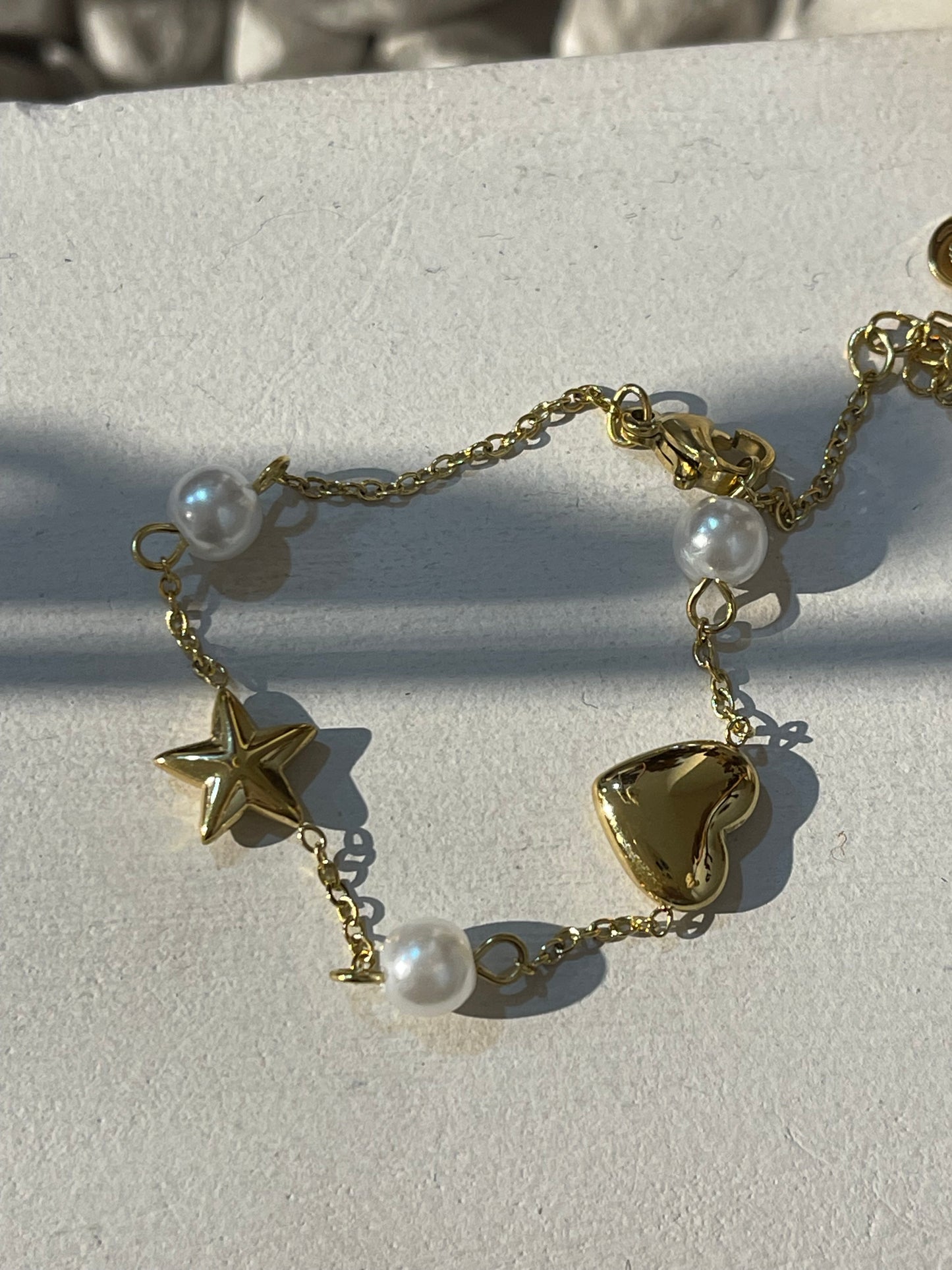 Pulsera estrella corazón