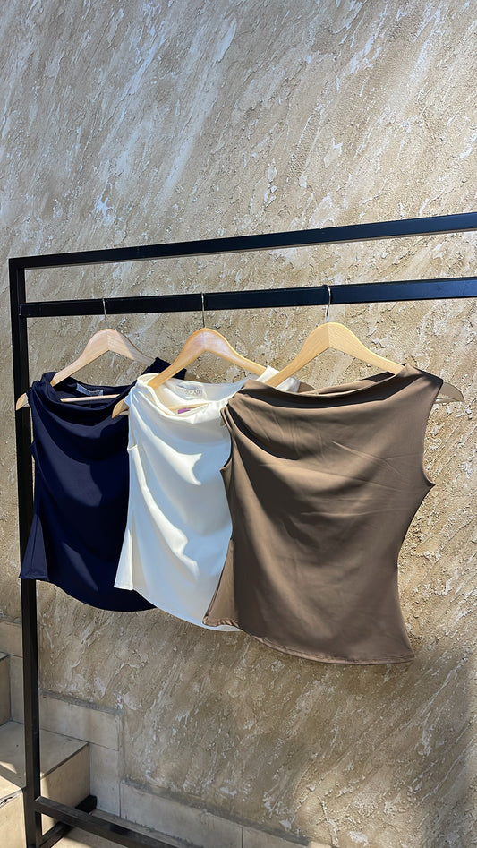 Top asimétrico nudo