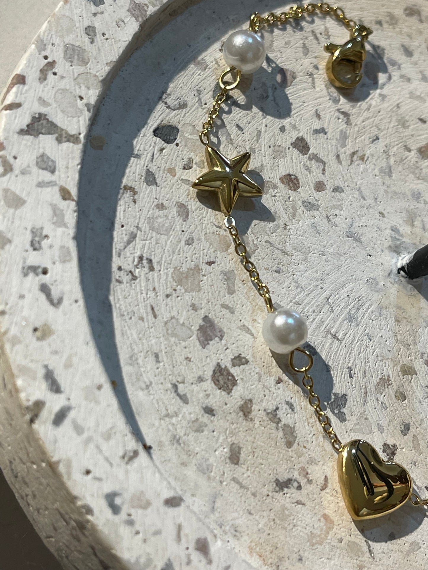 Pulsera estrella corazón