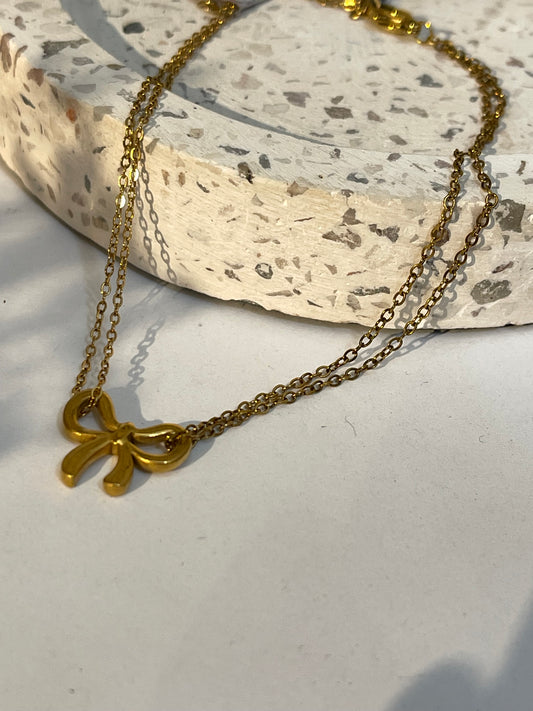 Pulsera dije moño