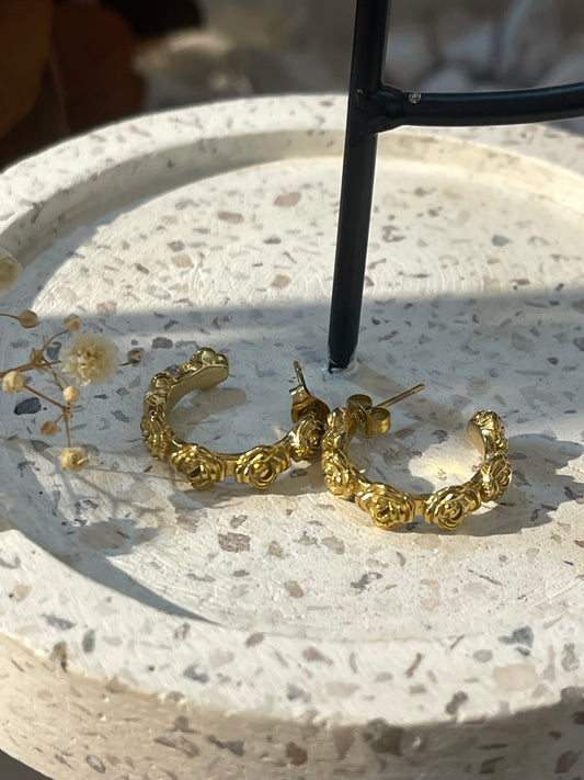 Aretes rosa unidas