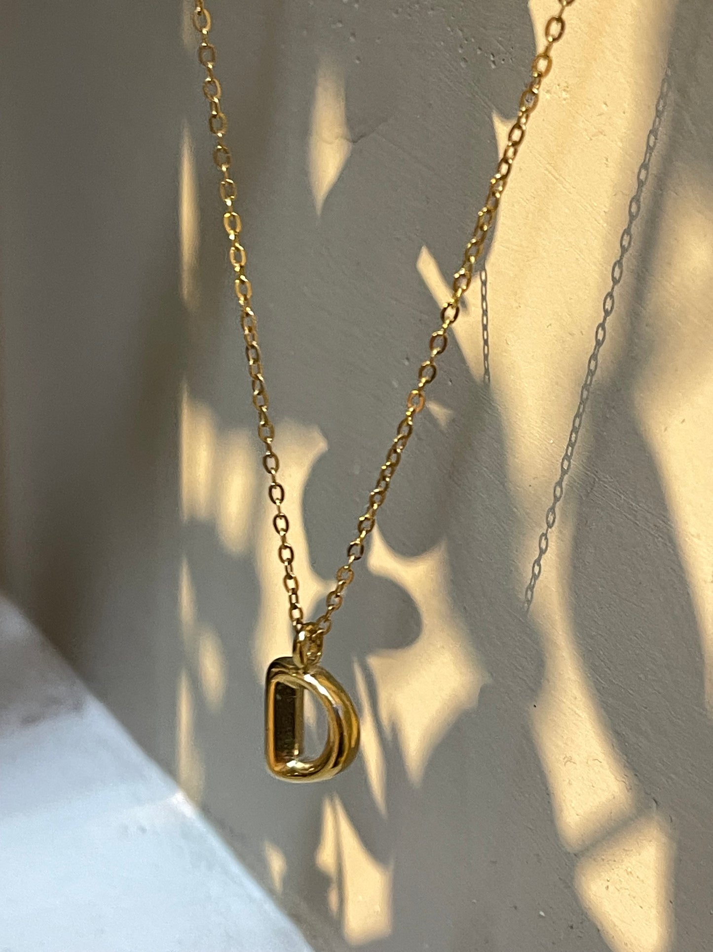Collar letra D